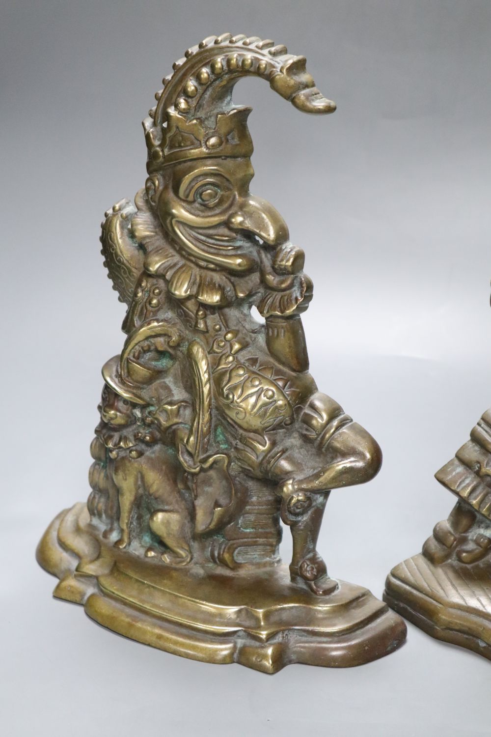 A pair of Victorian cast brass Punch and Judy door-stops, Punch 30cm